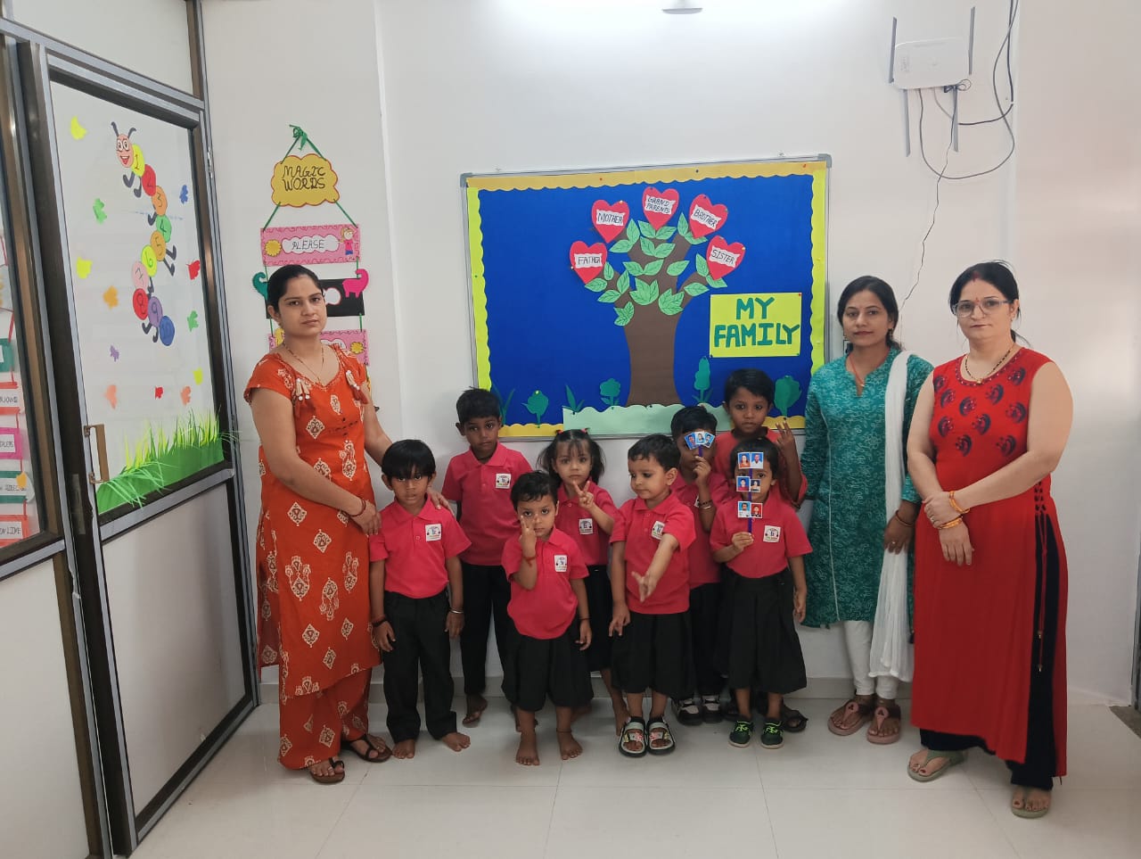 Students with their teachers at the My Family board