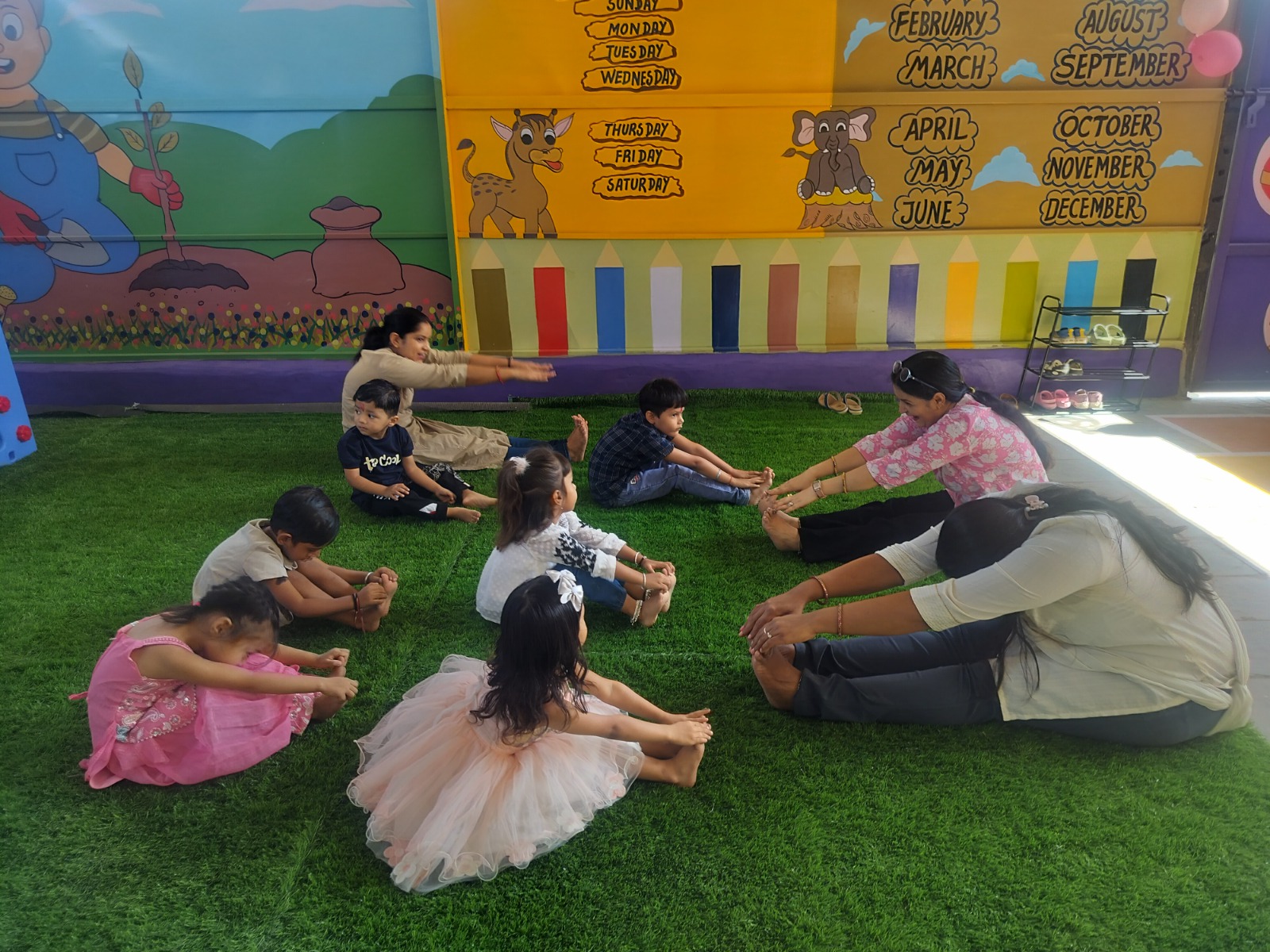 Students and teachers doing stretching exercises