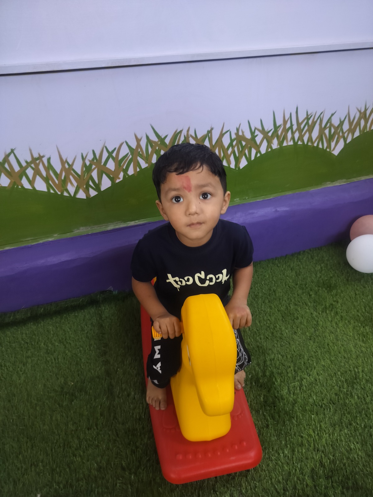 A student at Lily Lotus Preschool Becharaji